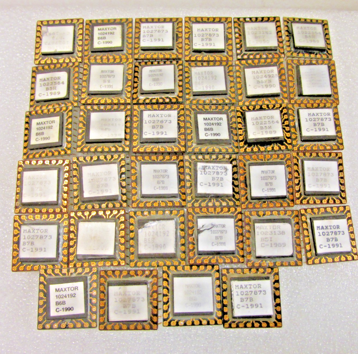 Lot of 34 MAXTOR PROMs Gold top and legs – Scrap for Gold Recovery.