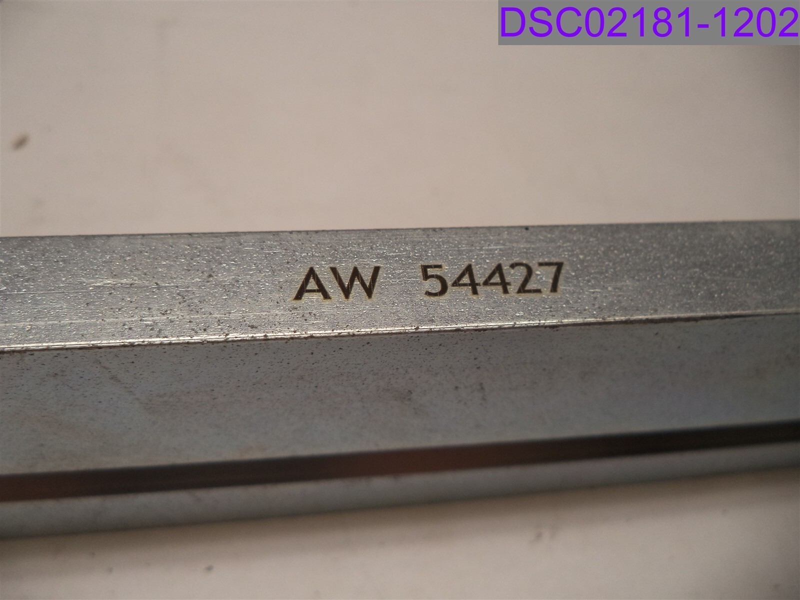 AW 54427. 13-3/8″ L x 2″ tapering to 1-3/8″. 1/2″ thick. 5/8″ front bore