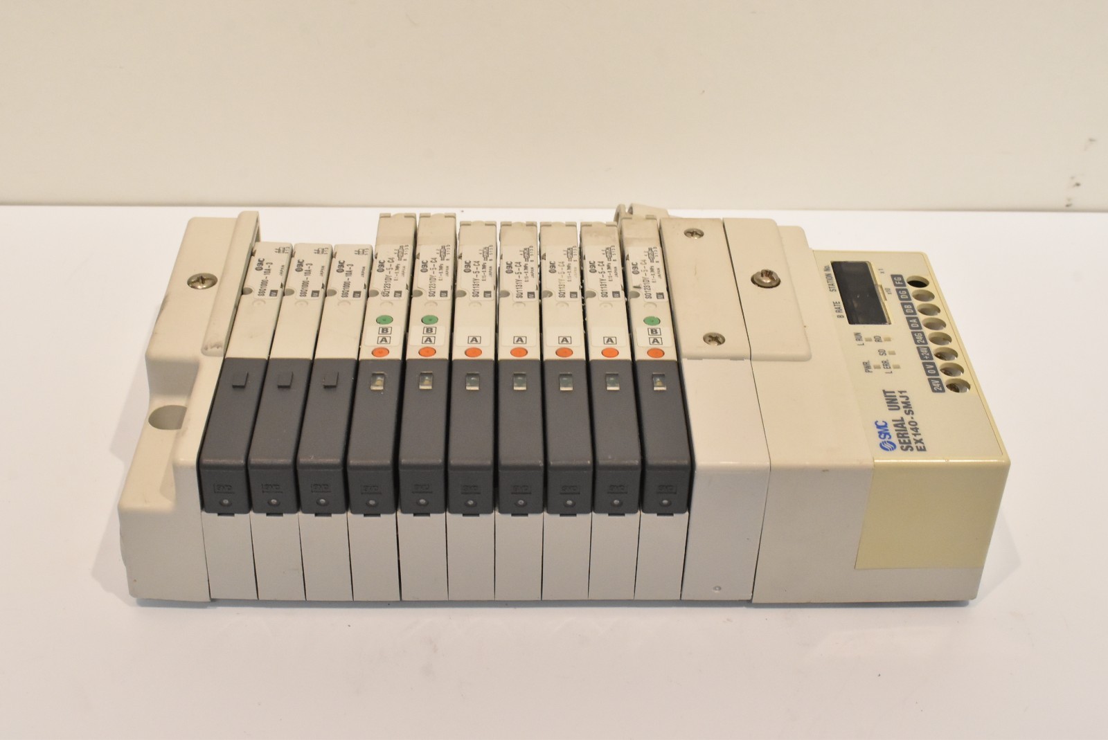 SMC manifold w/ EX140-SMJ1 and SQ1231DY-5-C4, SQ1131Y-5-C4.SSQ1000-10A-3 valves