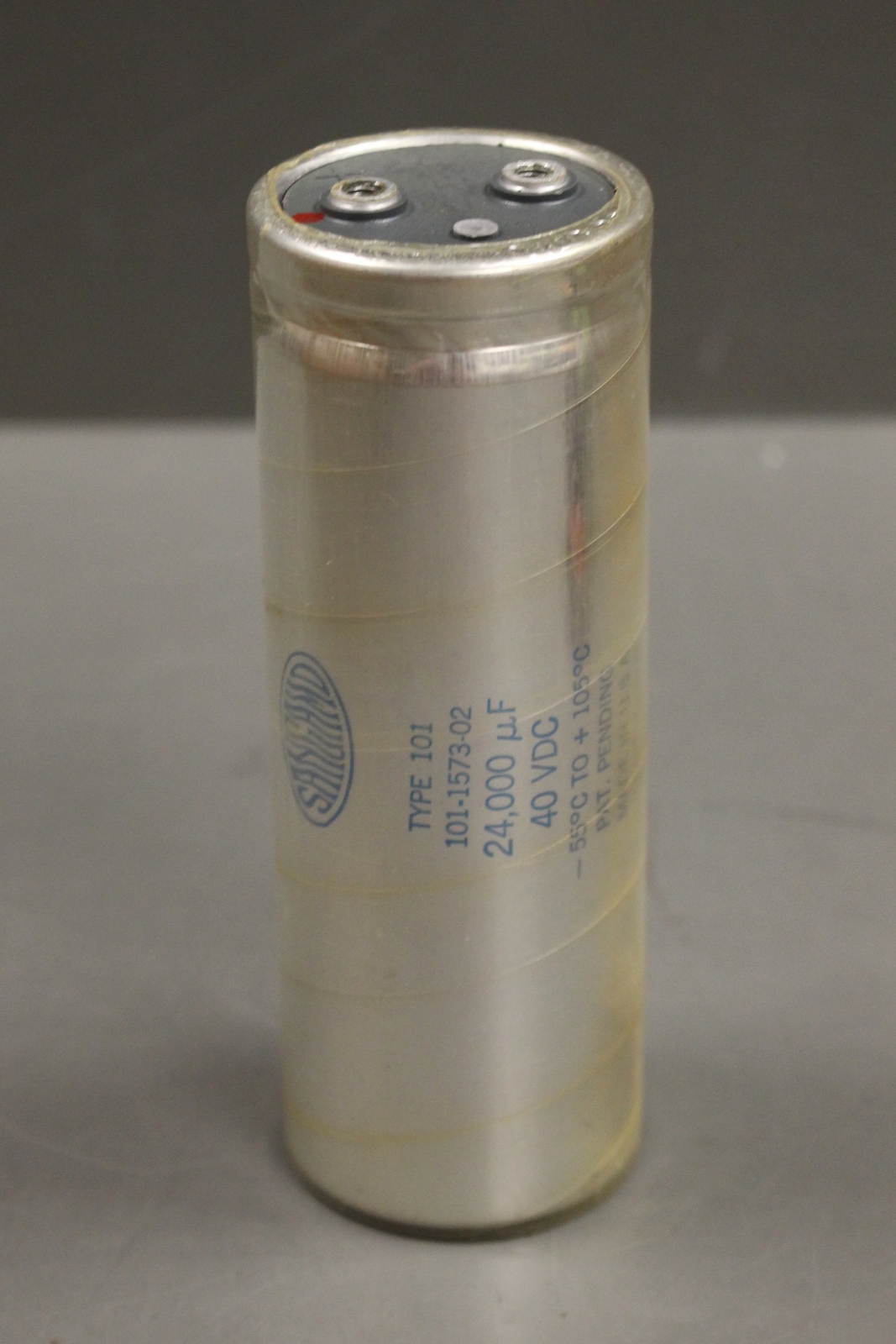 Electrolytic Fixed Capacitor, 101243U040BF2A, 77C717442P011, Silver, New