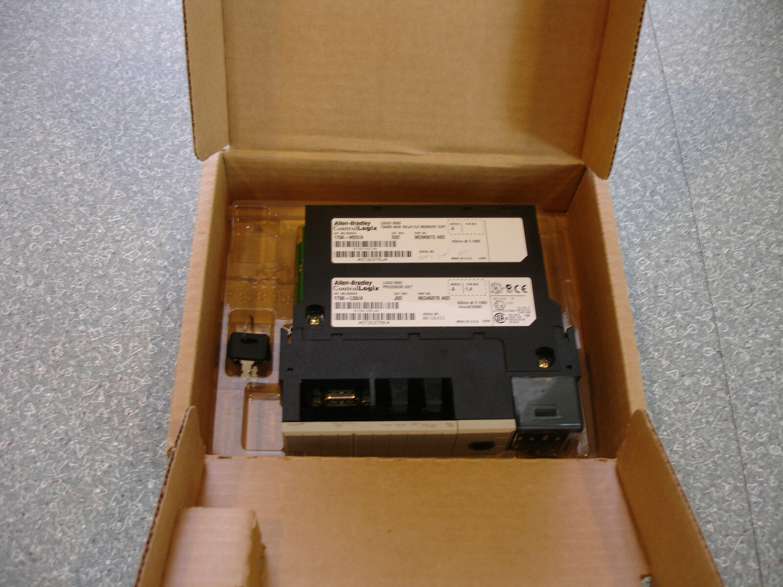 ALLEN-BRADLEY 1756-L55/A PROCESSOR UNIT W/ KEY & 1756-M22/A MEMORY EXP.