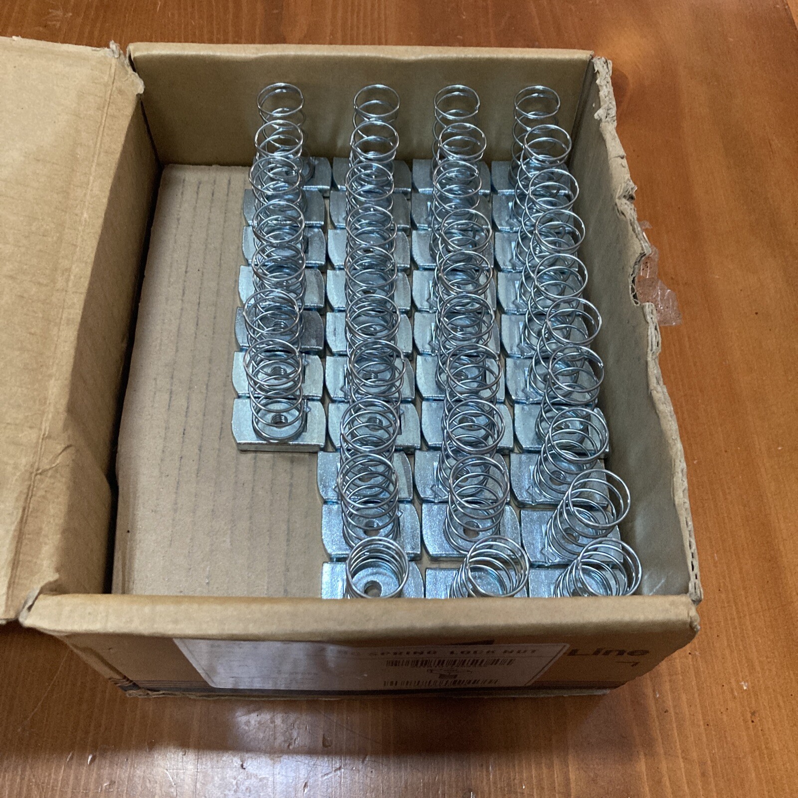 (87 PCs) NEW COOPER B-LINE N224 ( 1/4 ) ZINC SPRING LOCK NUT PARTIAL BOX