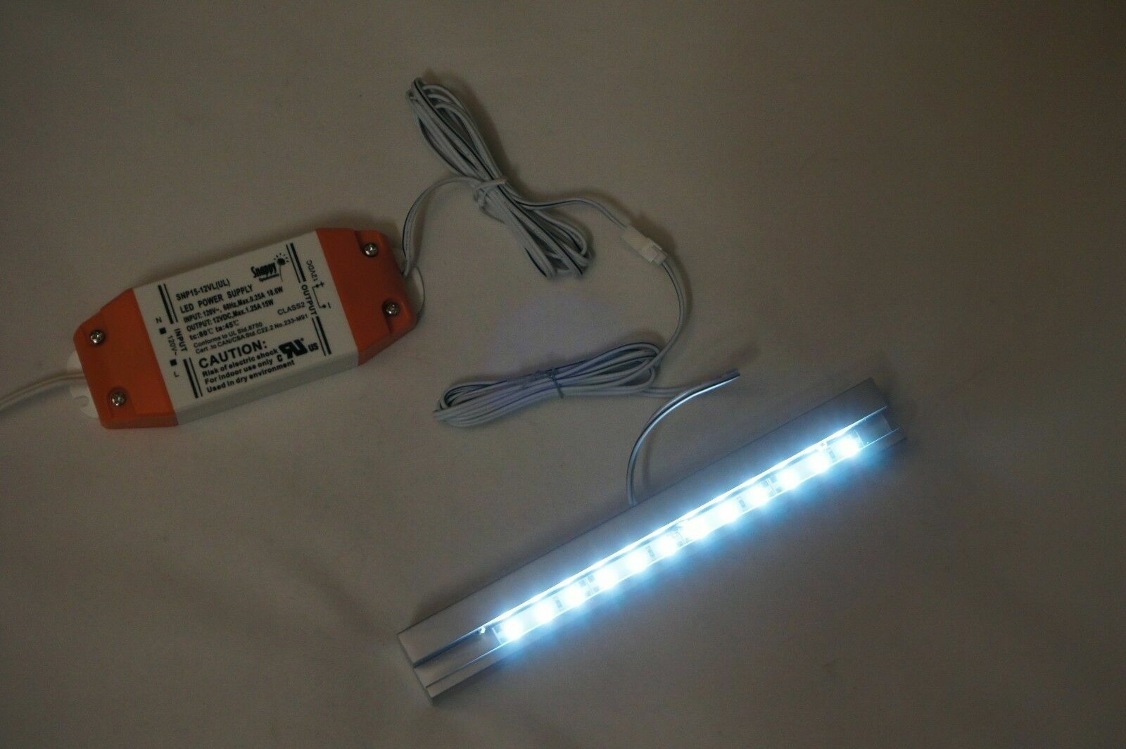 Sign Rail with White LED Lights Create A Backlit Display, Silver Satin