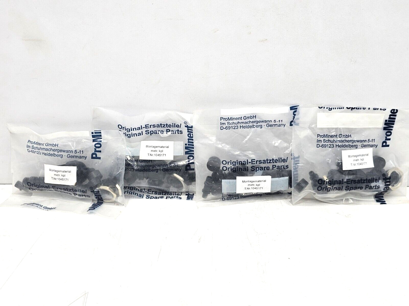 1045171 PROMINENT MONTAGEMATERIAL METR. KPL 1045171 LOT OF 4