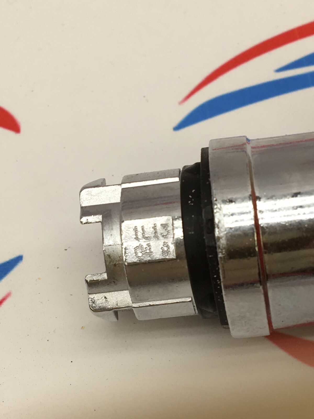1L13 Q4 A RED E-STOP MUSHROOM HEAD BUTTON OPERATOR