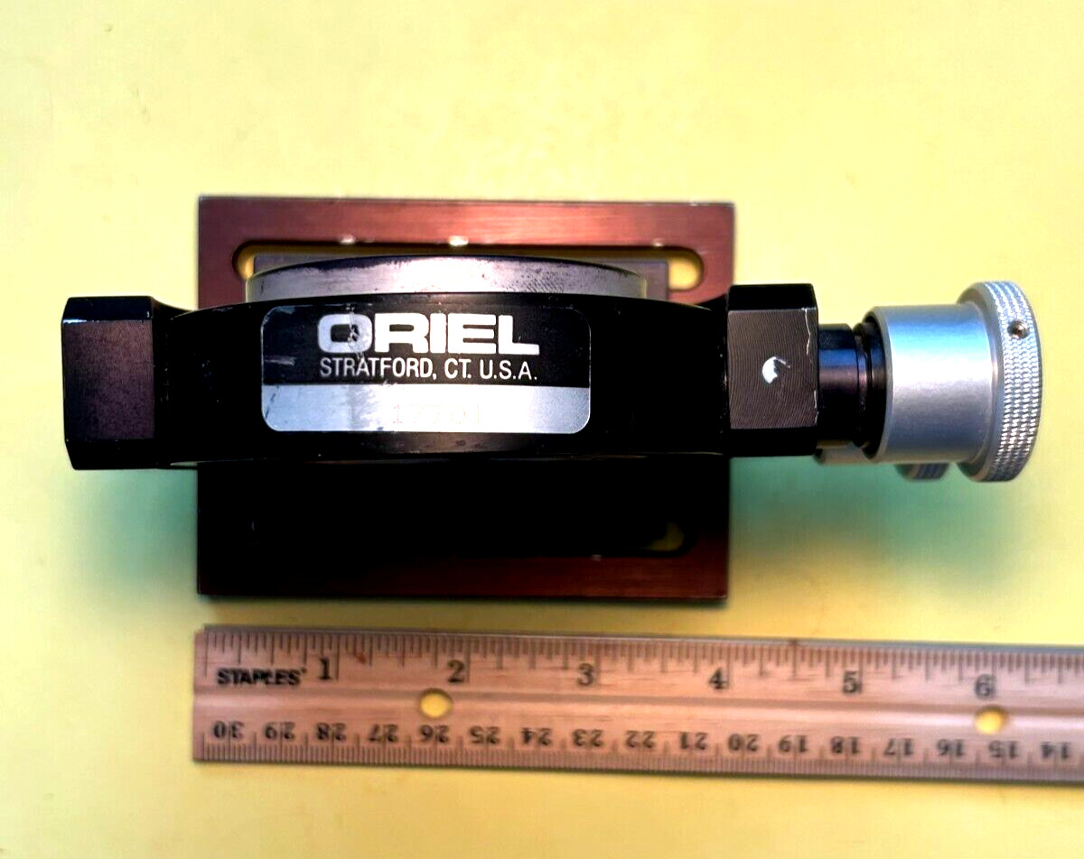 Oriel model 17701 Gimbal mirror mount on baseplate with mirror.