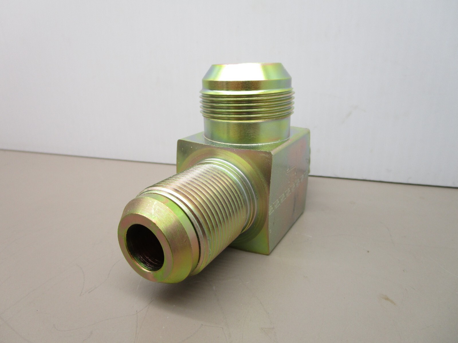 New Flyer 115509 Hydraulic Relief Valve Tee 65PSI 1″ ORB x 1-1/4″ x 1-5/8″ JIC