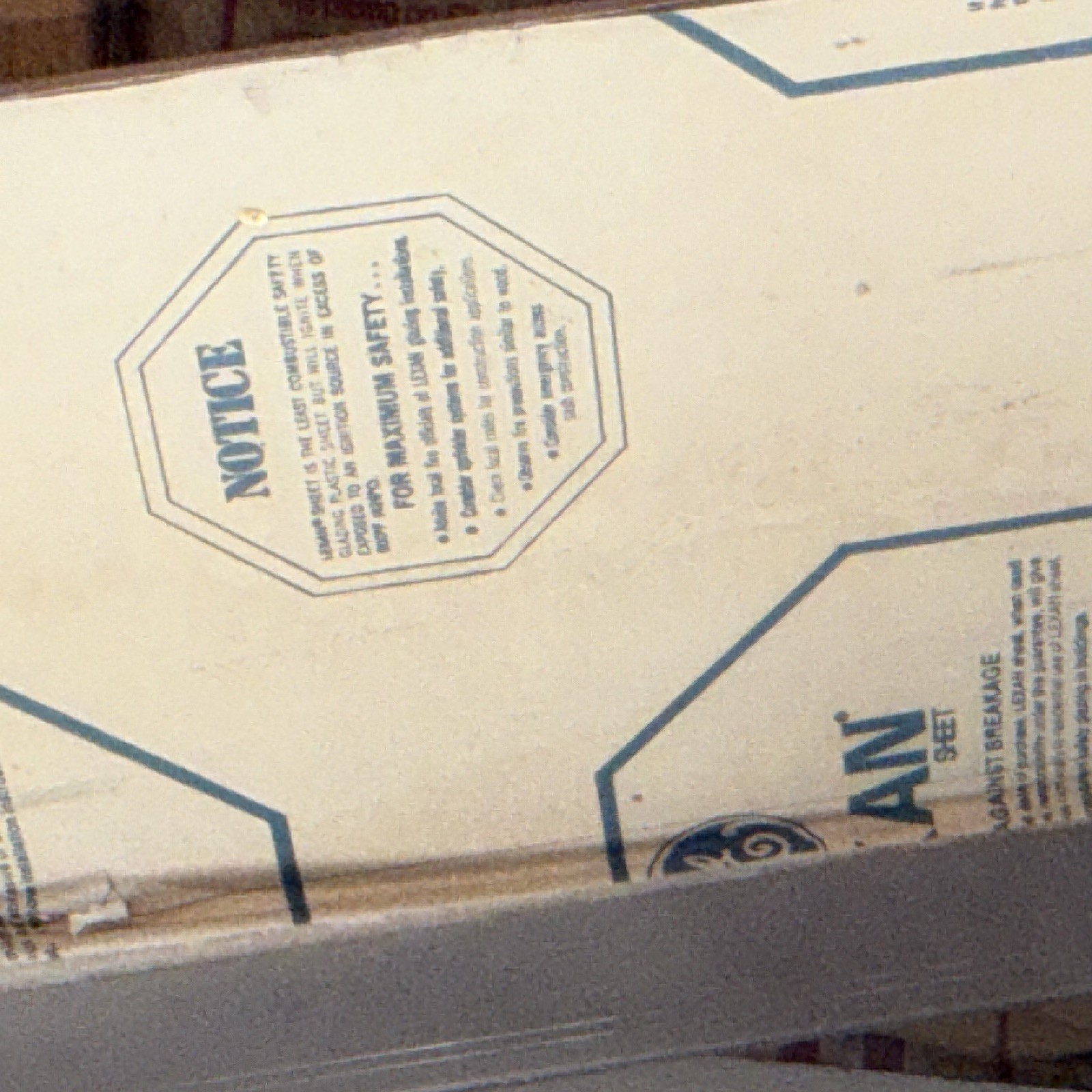 GE Business & Industrial Equipment Sheet with Safety Notice for Workplace Safety