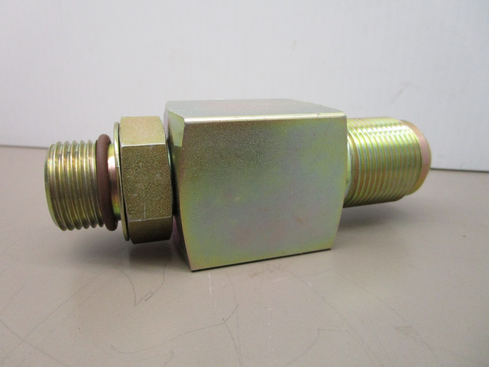 New Flyer 115509 Hydraulic Relief Valve Tee 65PSI 1″ ORB x 1-1/4″ x 1-5/8″ JIC