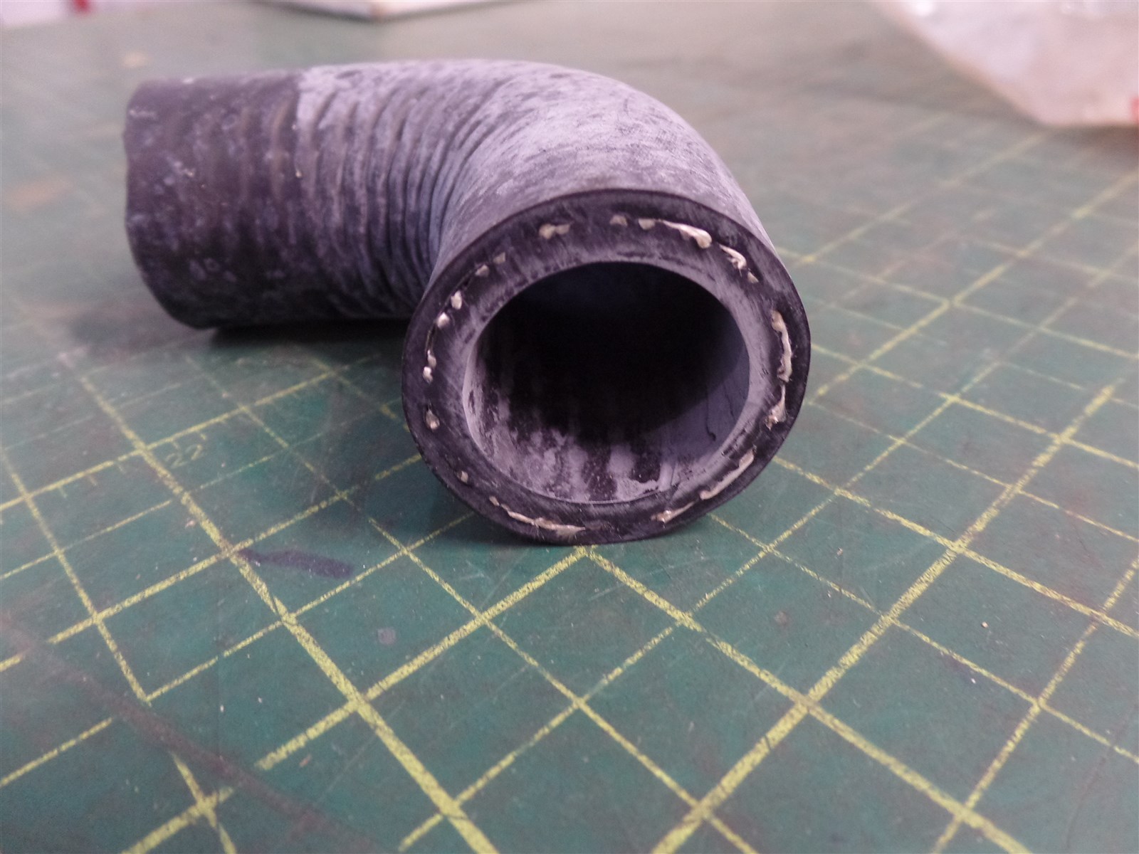 GENUINE TROJAN O&K 10209236900, 90° INTAKE HOSE,TEREX 10-209236900, NOS
