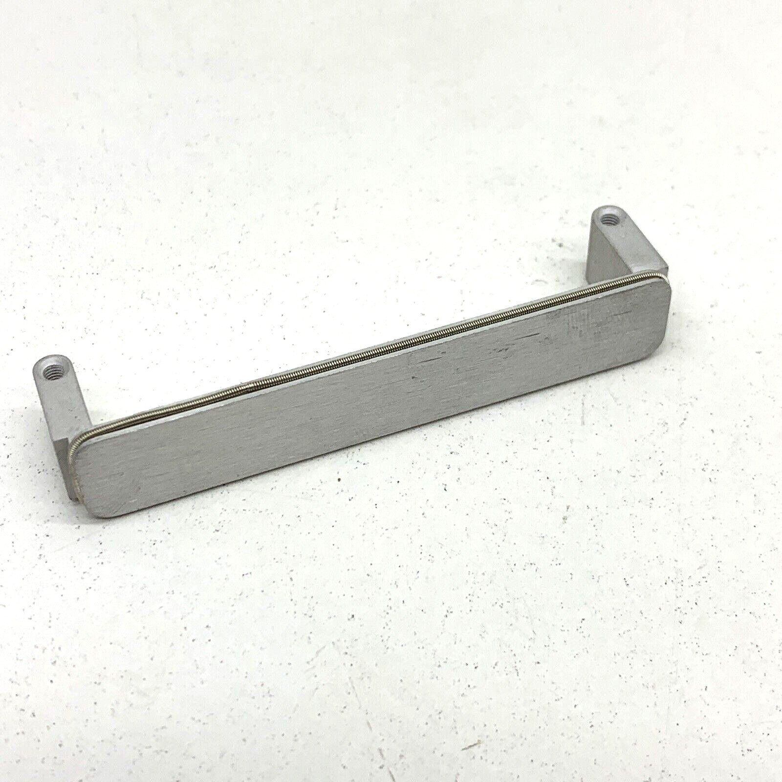 Emench Closure Plate