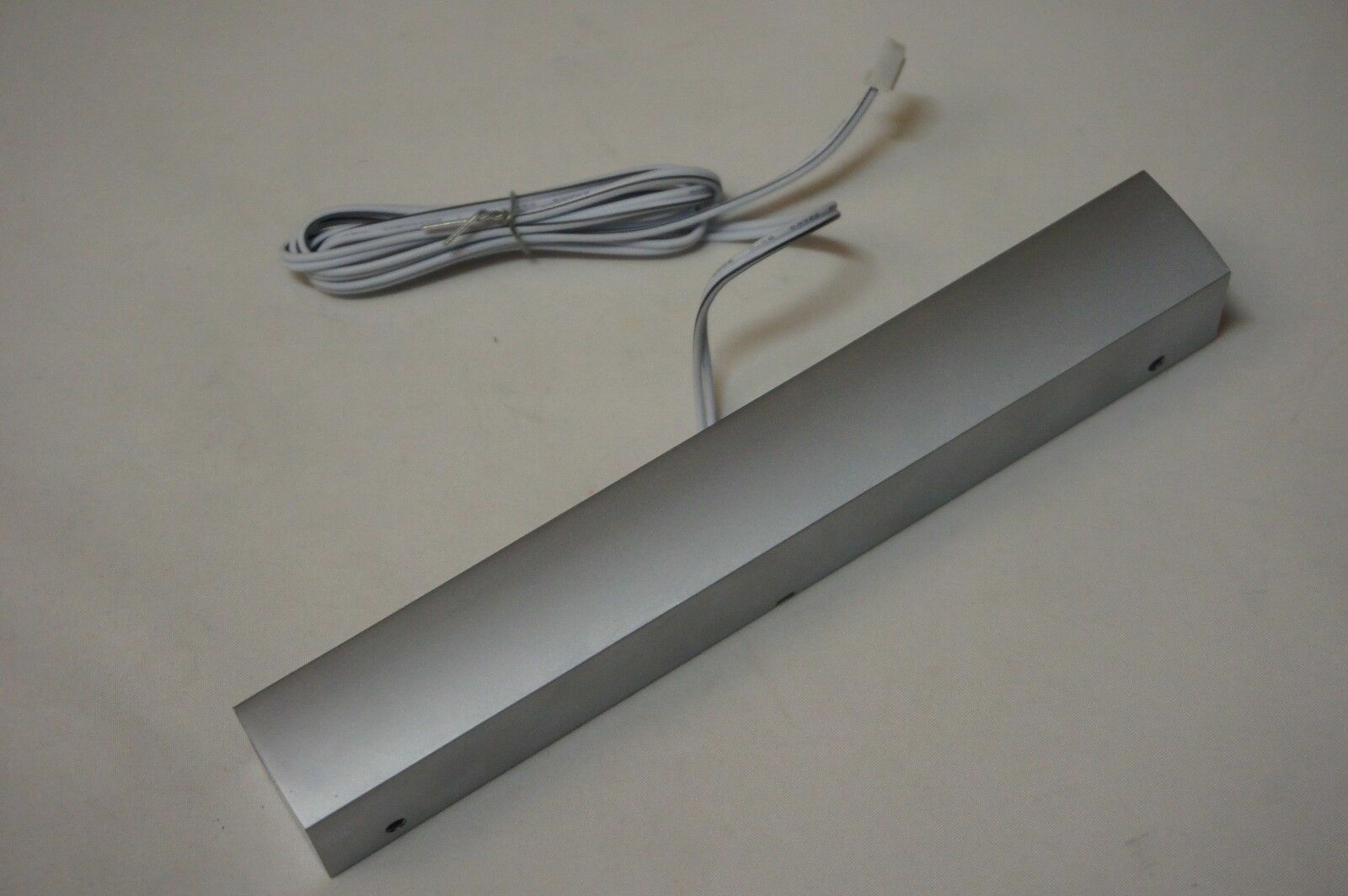 Sign Rail with White LED Lights Create A Backlit Display, Silver Satin