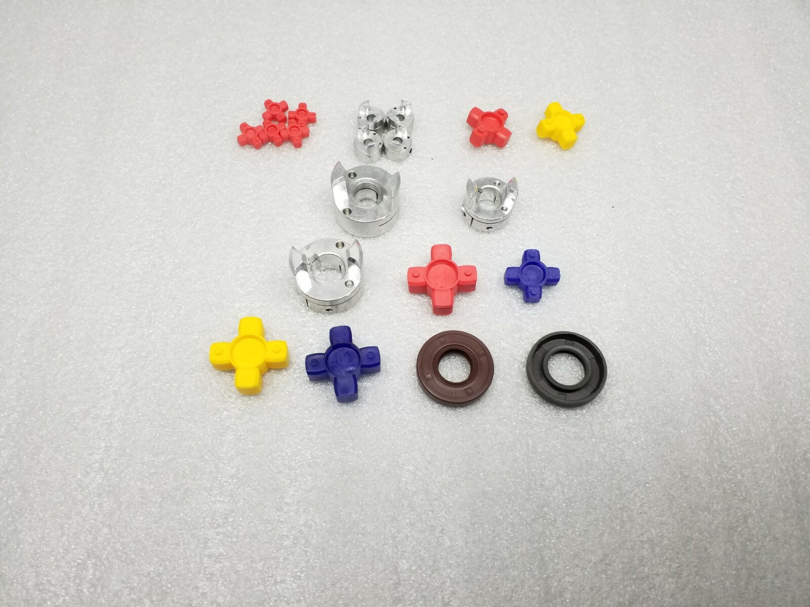 RULAND MANUFACTURING ASSORTED JAW COUPLING HUBS, SPIDERS, SEAL, AND RADIAL SHAFT