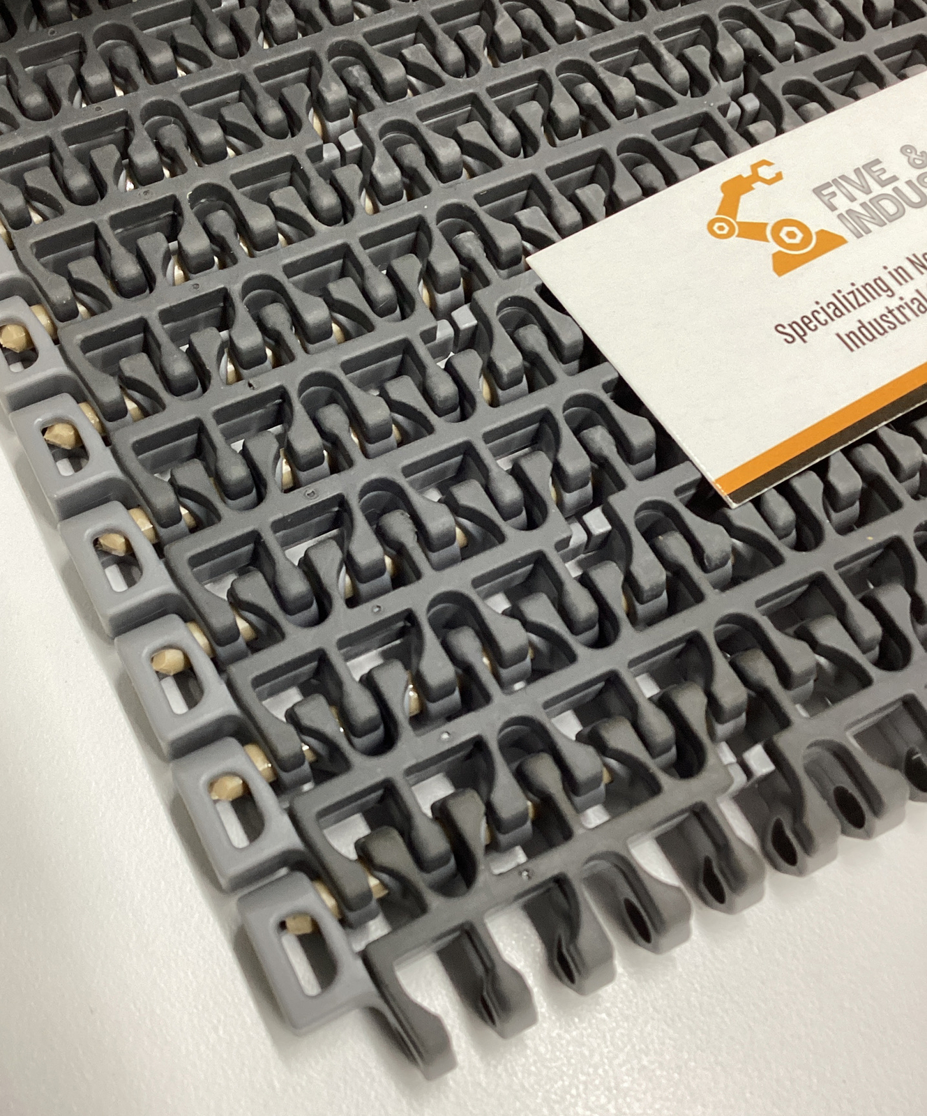 Intralox 23426 Grey 1100 Ser. Flush Grid Friction Top 8″ X 10′ 200 Rows