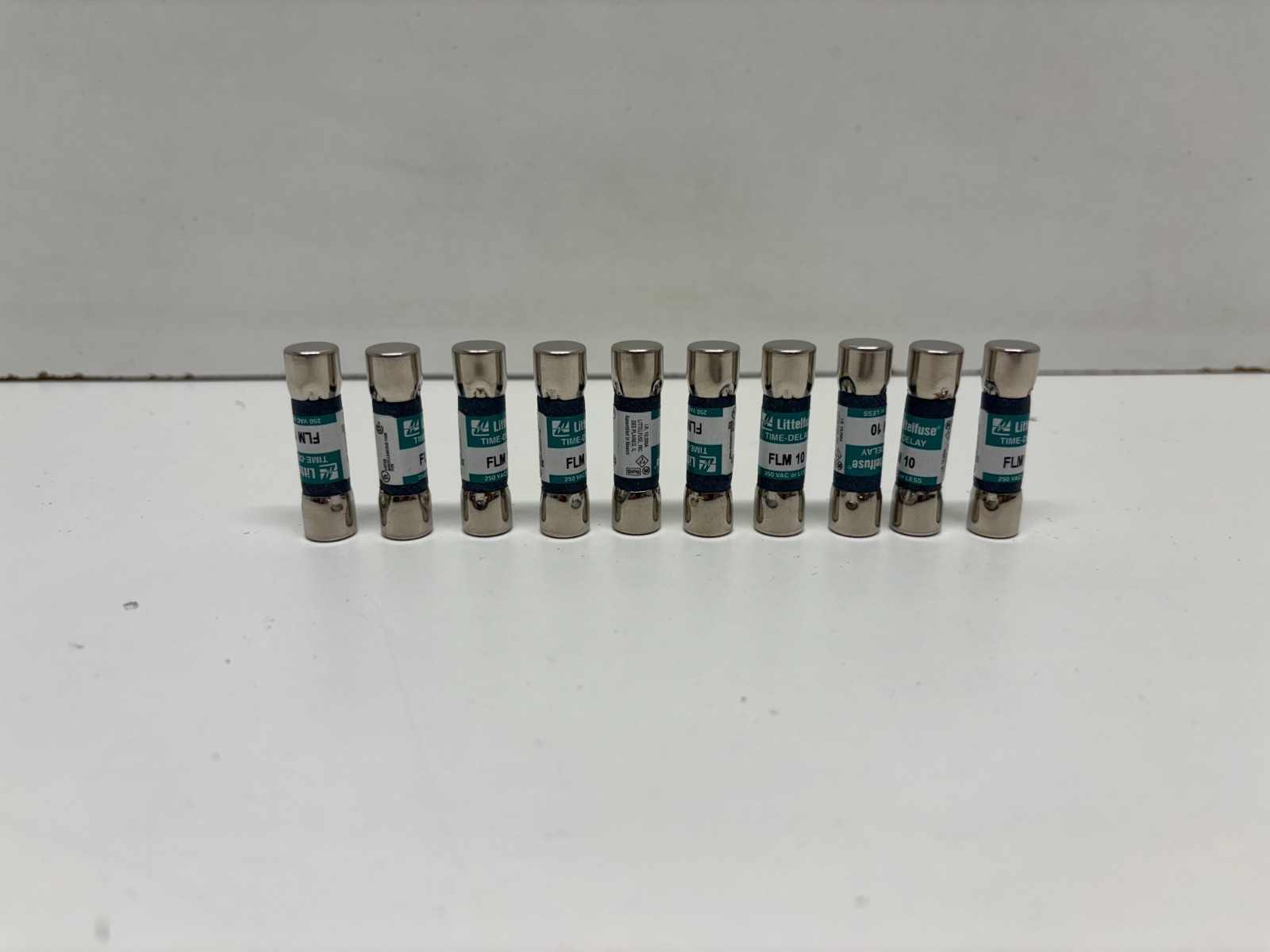 LOT OF 10 NEW OLD STOCK! BUSSMANN LITTELFUSE 10A 250VAC TIME DELAY FUSES FLM-10