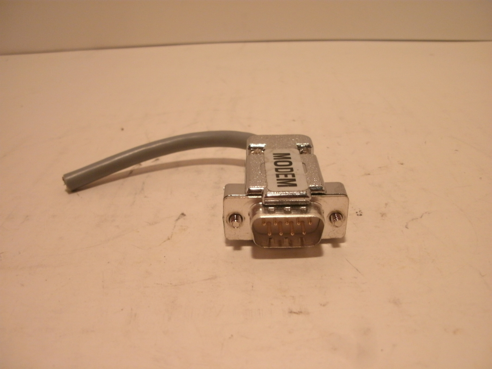 GENERIC MODEM PLUG 9 PIN WITH 3 INCH CORD PLASTIC PLUG CHROME FINISH