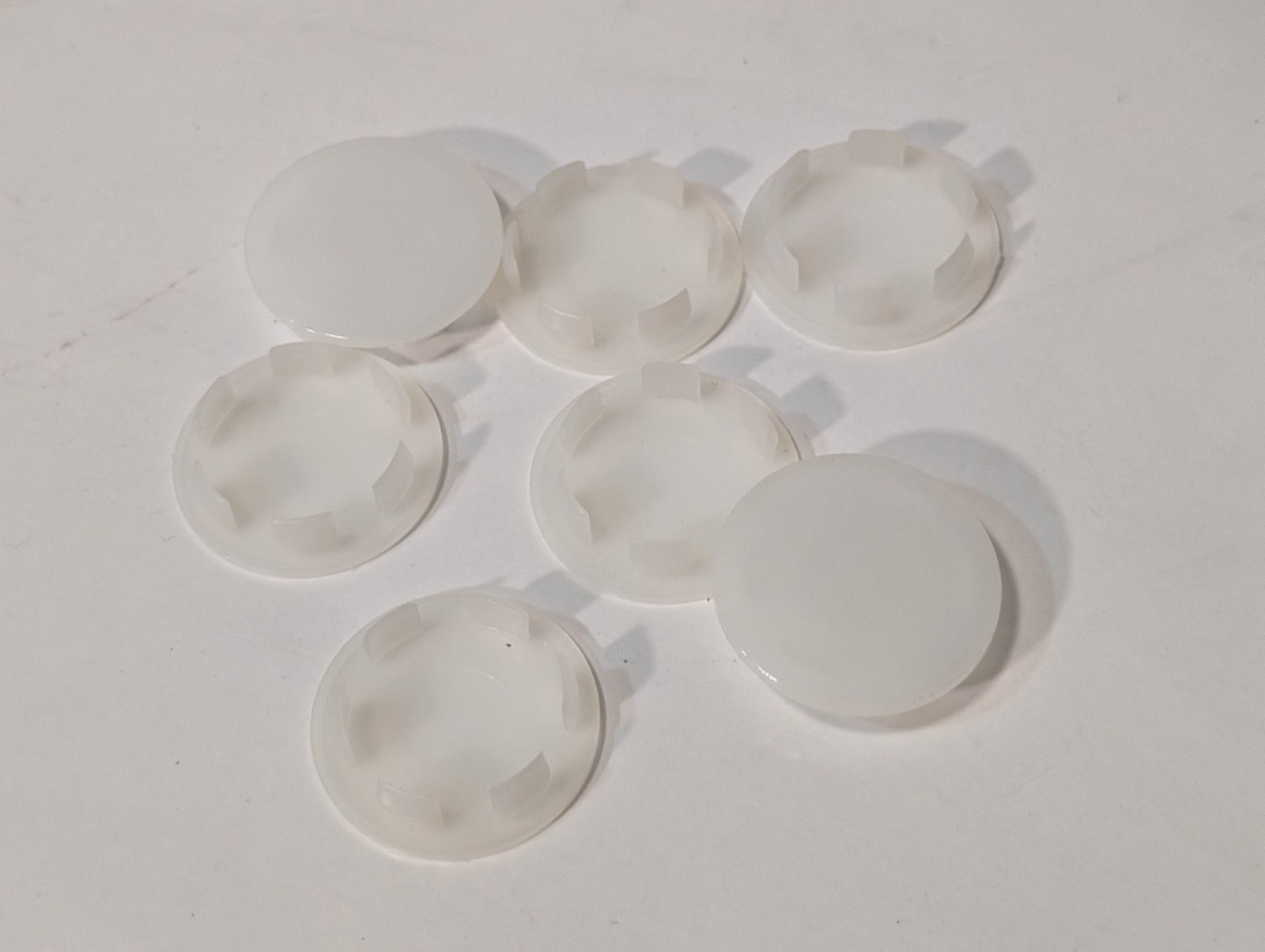 Lot of Approx. 700 Assorted Plastic Caps and Car Plugs, Various Sizes