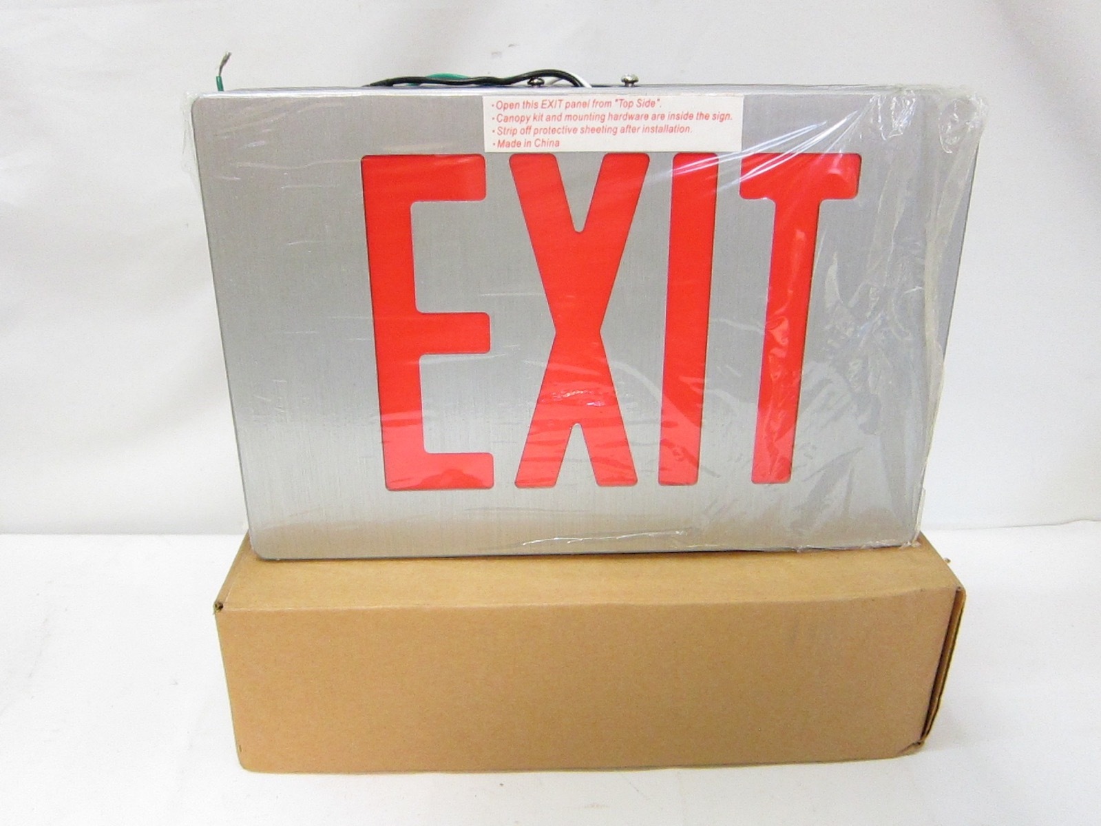 New in Box McPhilben Philips ER55LDT1R EM LED Cast Exit Sign 1R DT BA 120/277VAC