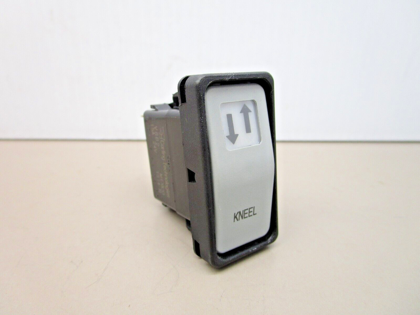 Carling V8B2 Rocker Switch “Kneel” 3-Pole 3-Pos Illuminated Momentary