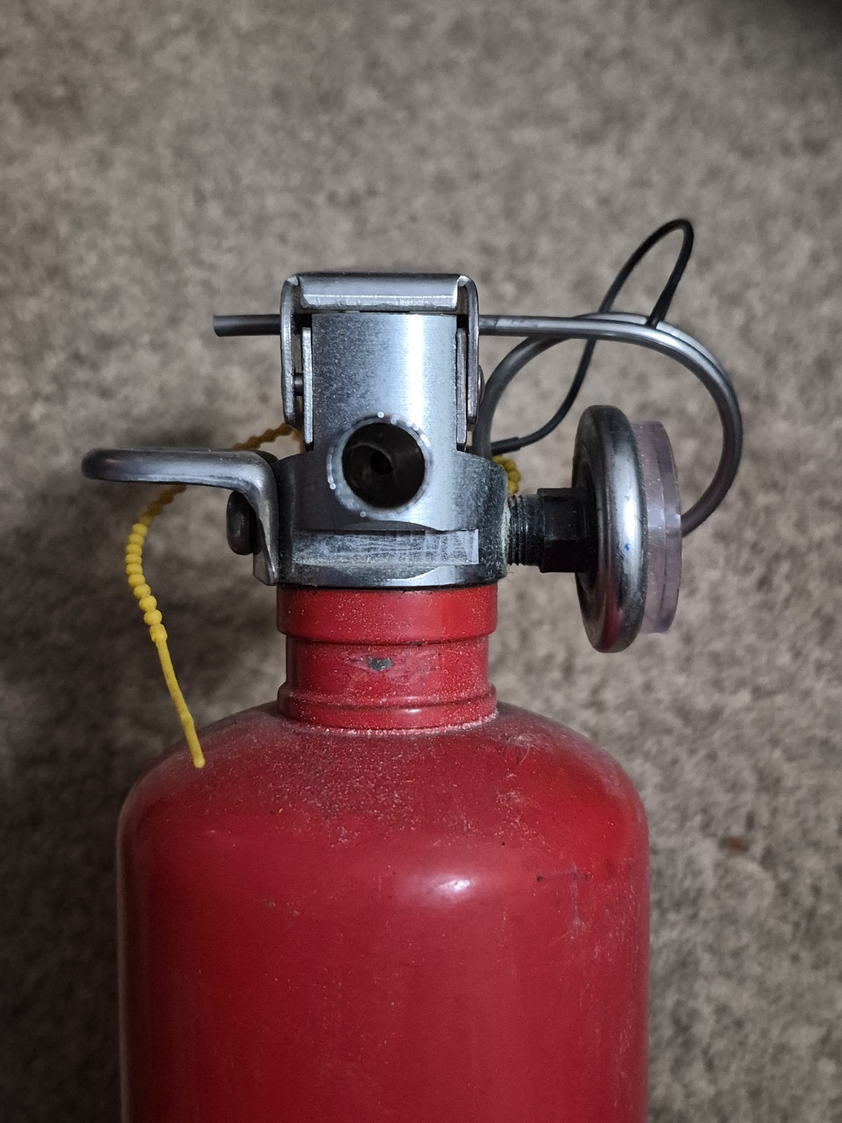 Badger 21007865 2.5 lb ABC Fire Extinguisher with Vehicle Bracket and insp. tag.