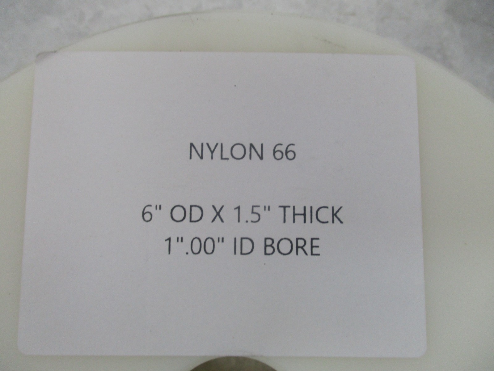 NYLON 66 6″ OD X 1.5″ THICK 1.00″ ID BORE, AB0143