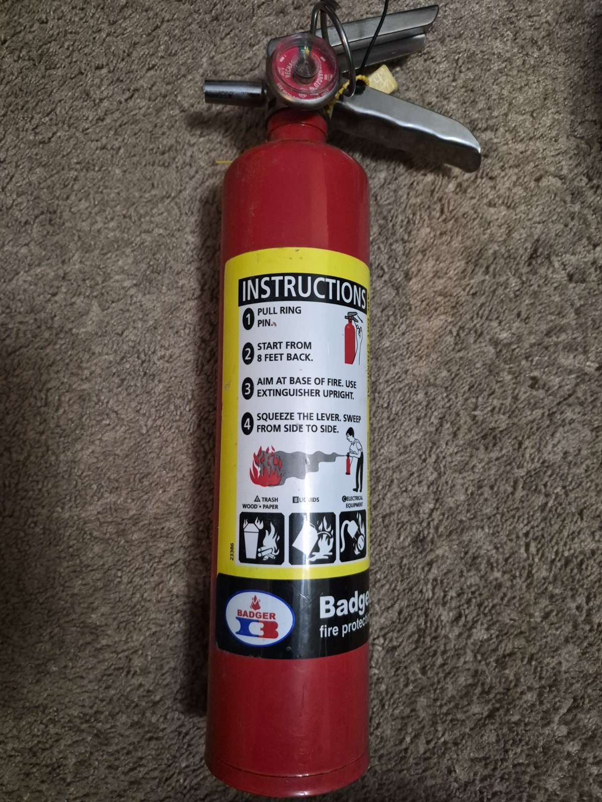 Badger 21007865 2.5 lb ABC Fire Extinguisher with Vehicle Bracket and insp. tag.