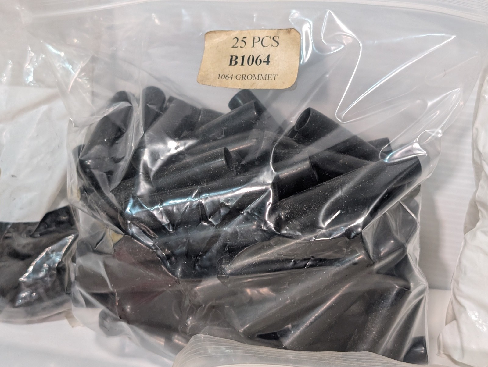 Lot of Approx. 700 Assorted Plastic Caps and Car Plugs, Various Sizes