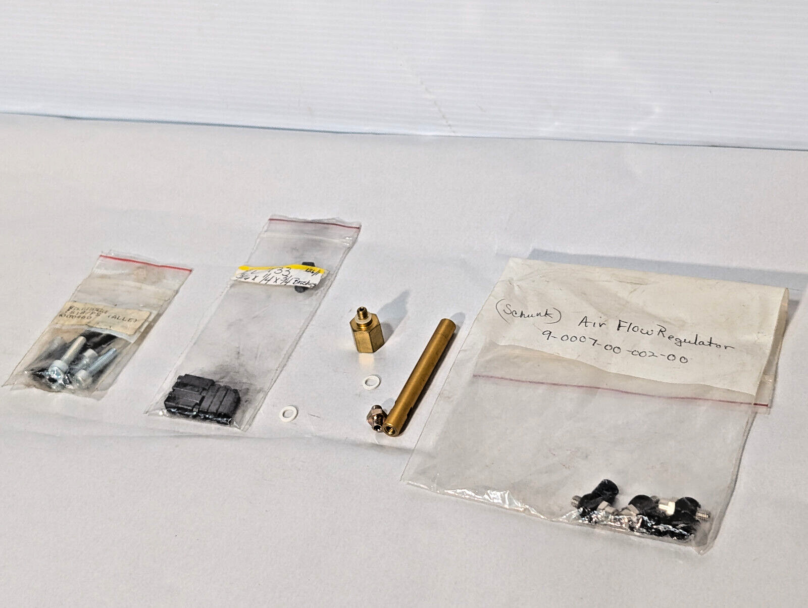 Lot of Small Mechanical Parts, Motor Brushes, Schunck Air Flow Regulator, More