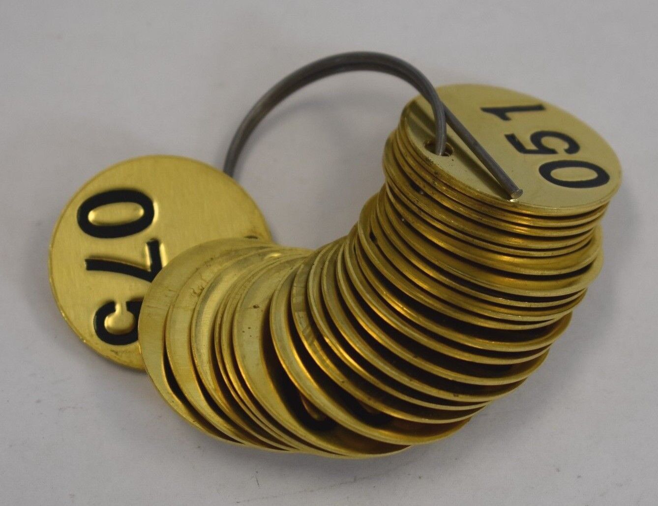 BRADY 23202 Numbered Tag Stamped Black on Brass 1-1/2″ Circle 051-075 25 Pack