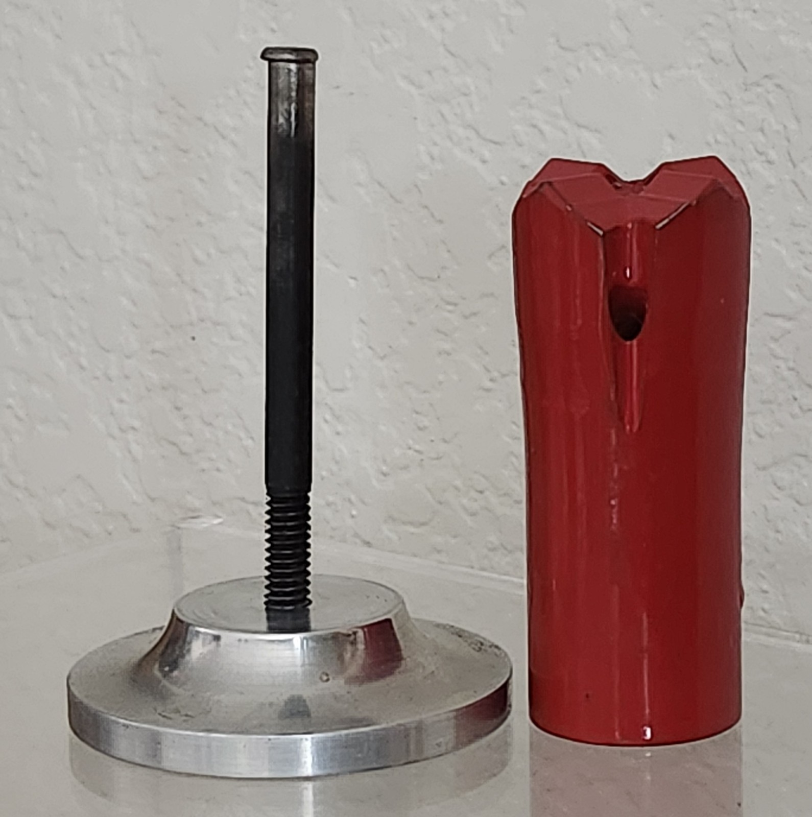 Rock Drill Bit Unmarked Red 1 1/4″ Diameter x 2 15/16″ tall w/ Aluminum Base