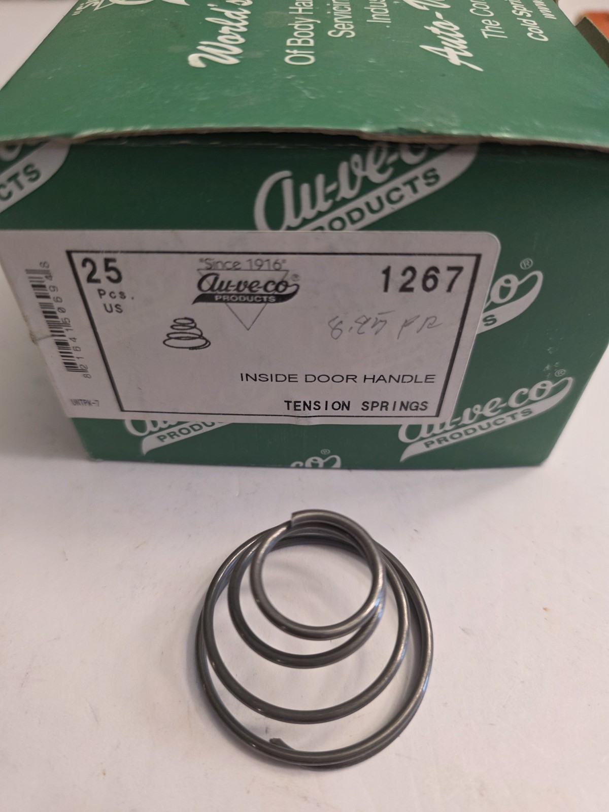 BOX OF 21 NOS AUVECO 1267 TENSION SPRINGS. INSIDE DOOR HANDLES