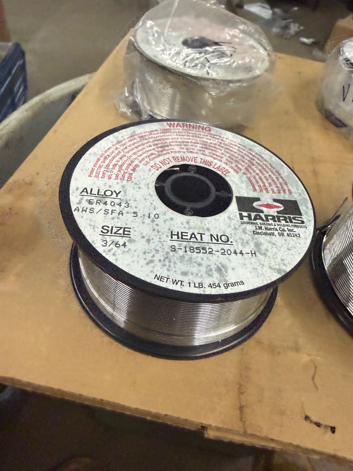 1 Ib spool of Harris brand ER4043 aluminum welding wire.