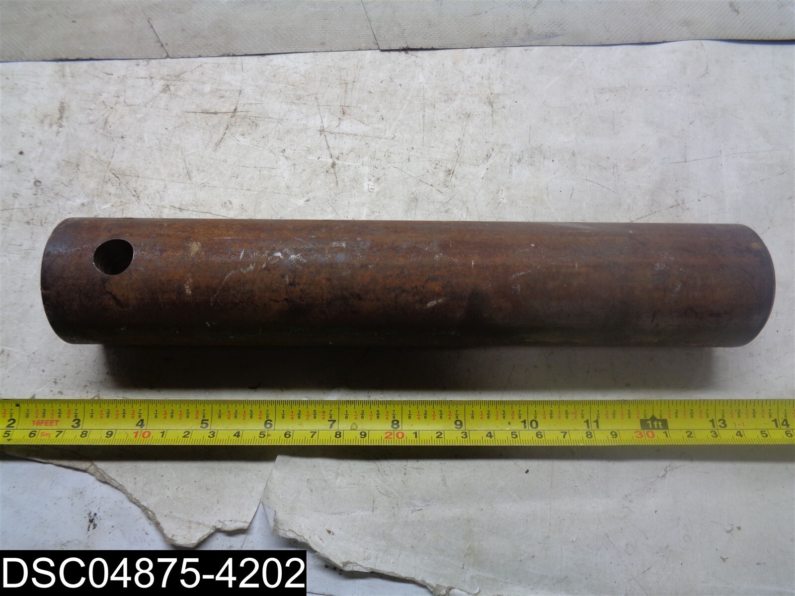 10-5/8″ Long Equipment Pin With 2″ OD and 9/16″ Bolt Hole