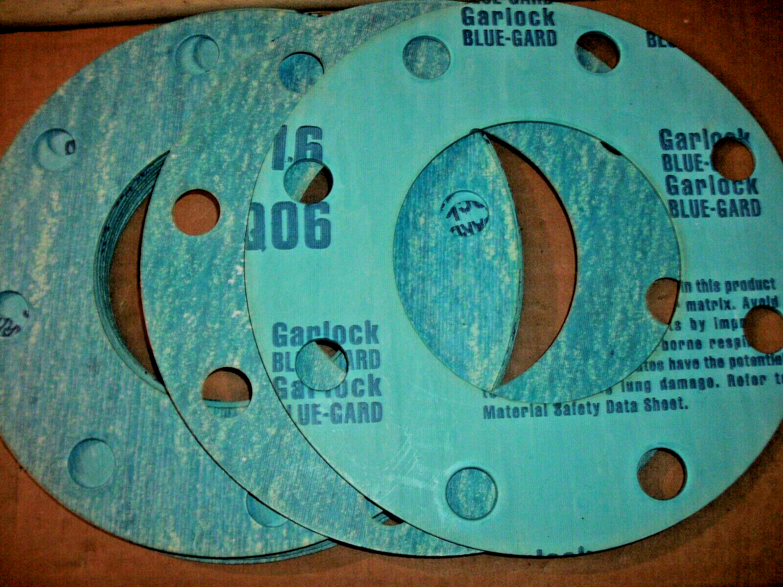 LOT OF 11 GARLOCK BLUE-GARD 8-HOLE GASKET FOR 4″ FLANGE ID 4 1/2″ x OD 9″x 1/16″