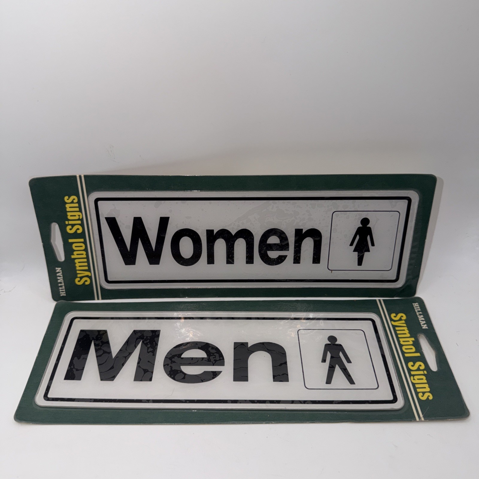 Hillman Symbol Set of 2 Signs MEN & WOMEN 3″ x 9″ NEW SEALED