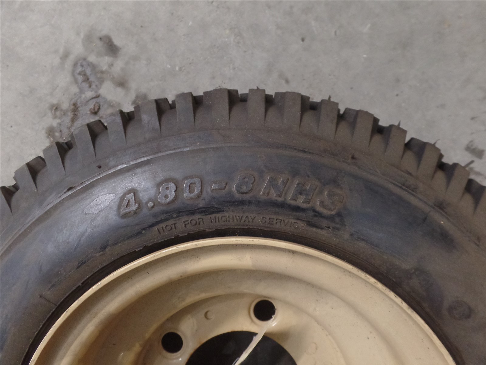GENUINE OMNIQUIP PARTS 711577100 TIRE & WHEEL ASSEMBLY, CARLISLE 4.80-8NHS, NOS