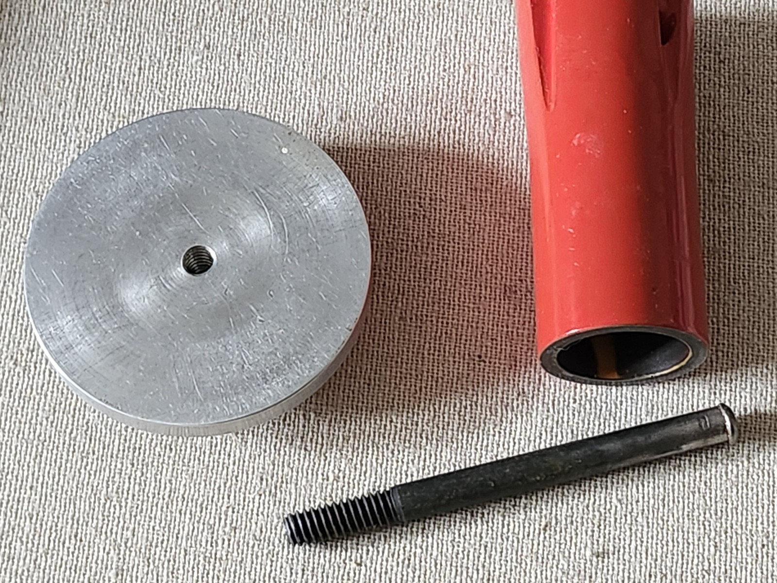 Rock Drill Bit Unmarked Red 1 1/4″ Diameter x 2 15/16″ tall w/ Aluminum Base