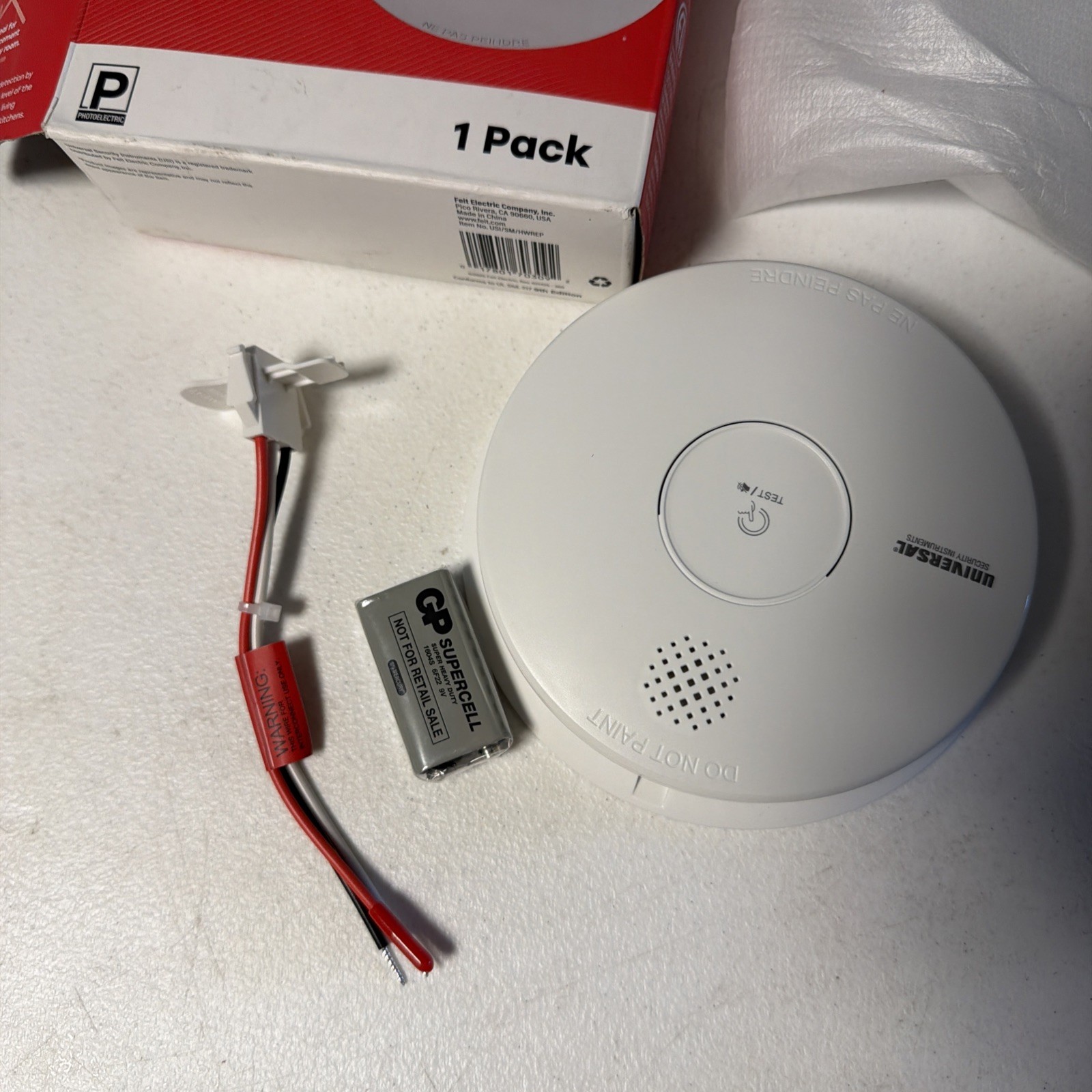 USI Hardwired and 1-Year Battery Backup Smoke Detector with Photoelectric Sensor