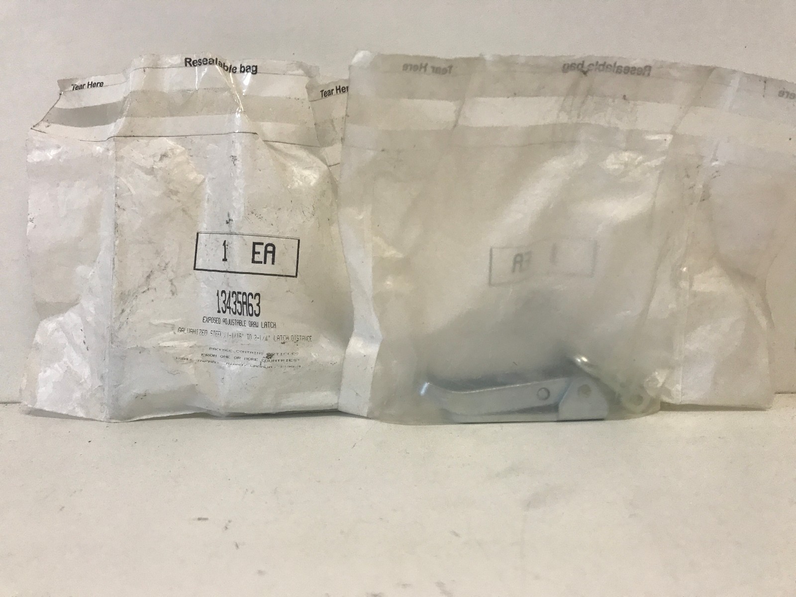 LOT OF (2) NEW IN BAG! EXPOSED ADJUSTABLE DRAW LATCHES 1-16″ TO 2-1/4″ 13435A63