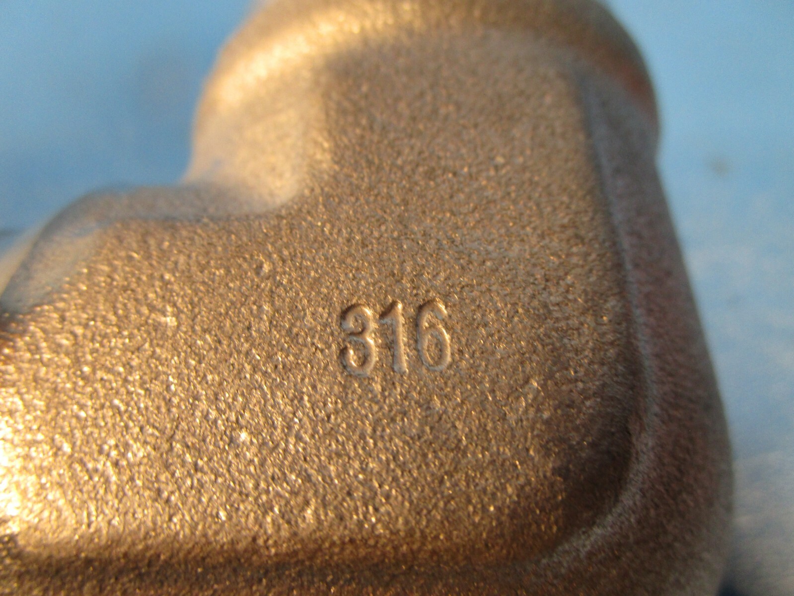 Brennan 2502-20-20SS, 90 Degree Elbow 1 1/4″ Female Pipe x 1 1/4 Male Flare