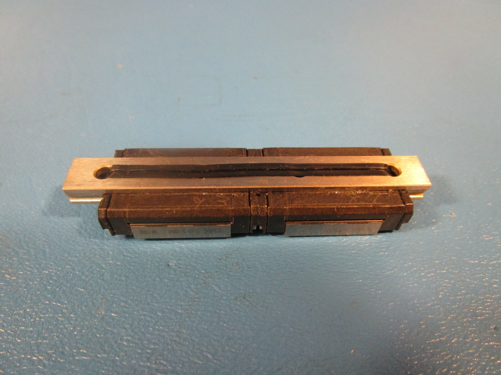 THK, 2SRS9MUUC1 + 75LPM, TWO SRS9M Linear Guide Blocks on a 75mm Rail