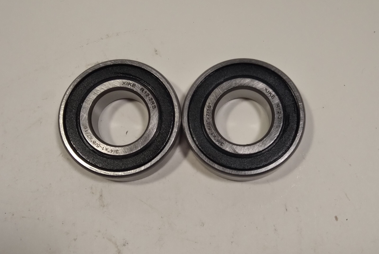 2 NEW XIKE BEARINGS R12-2RS RUBBER SEALED BALL BEARINGS NNB ***MAKE OFFER***