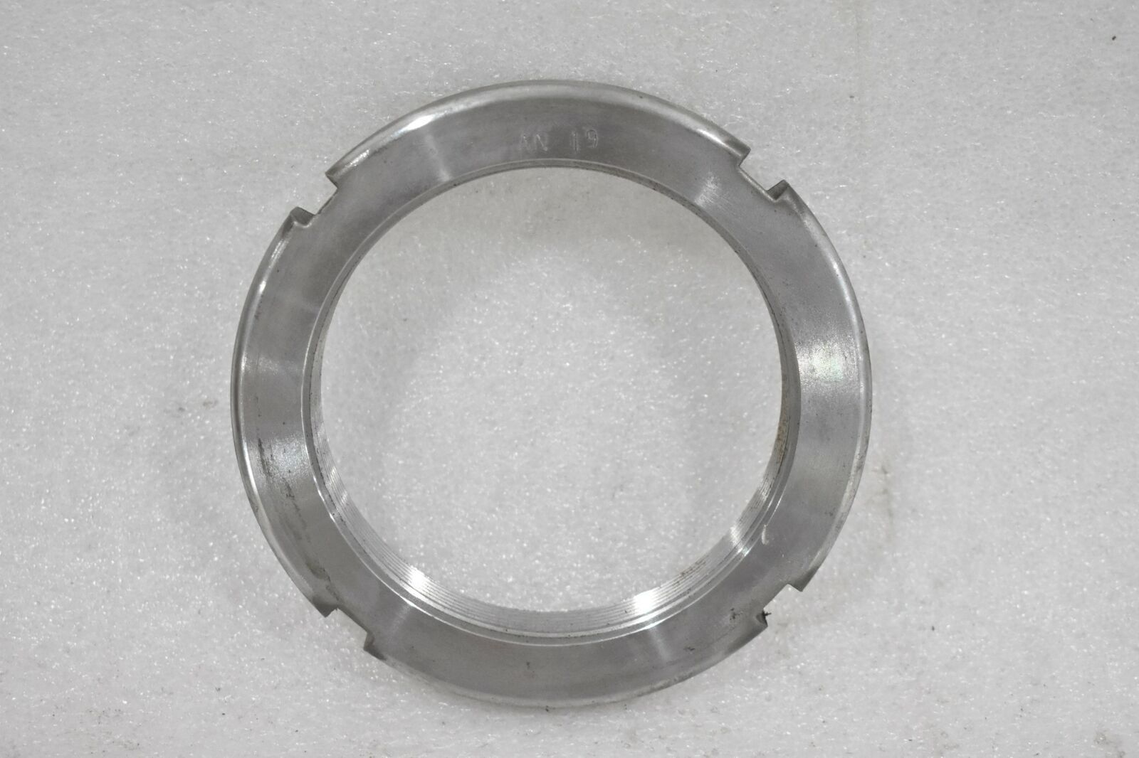 STANDARD LOCKNUT AN19 3.73-12″ THREAD SIZE, 4-15/16″ OD, 4.563″ FACE DIA.