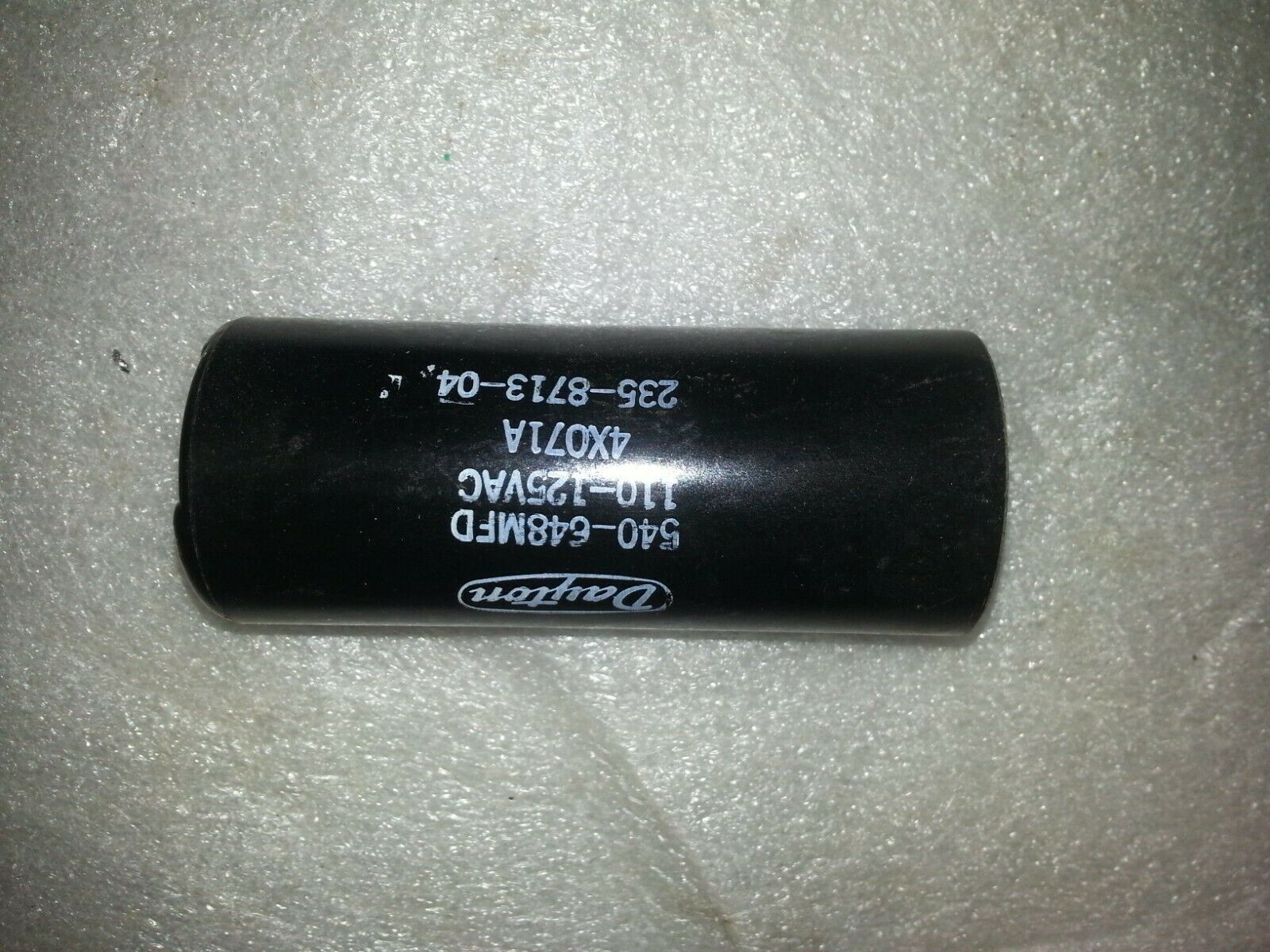 Dayton 4X071A Motor Start Capacitor 540-648 MFD 110-125VAC Electrical Industrial