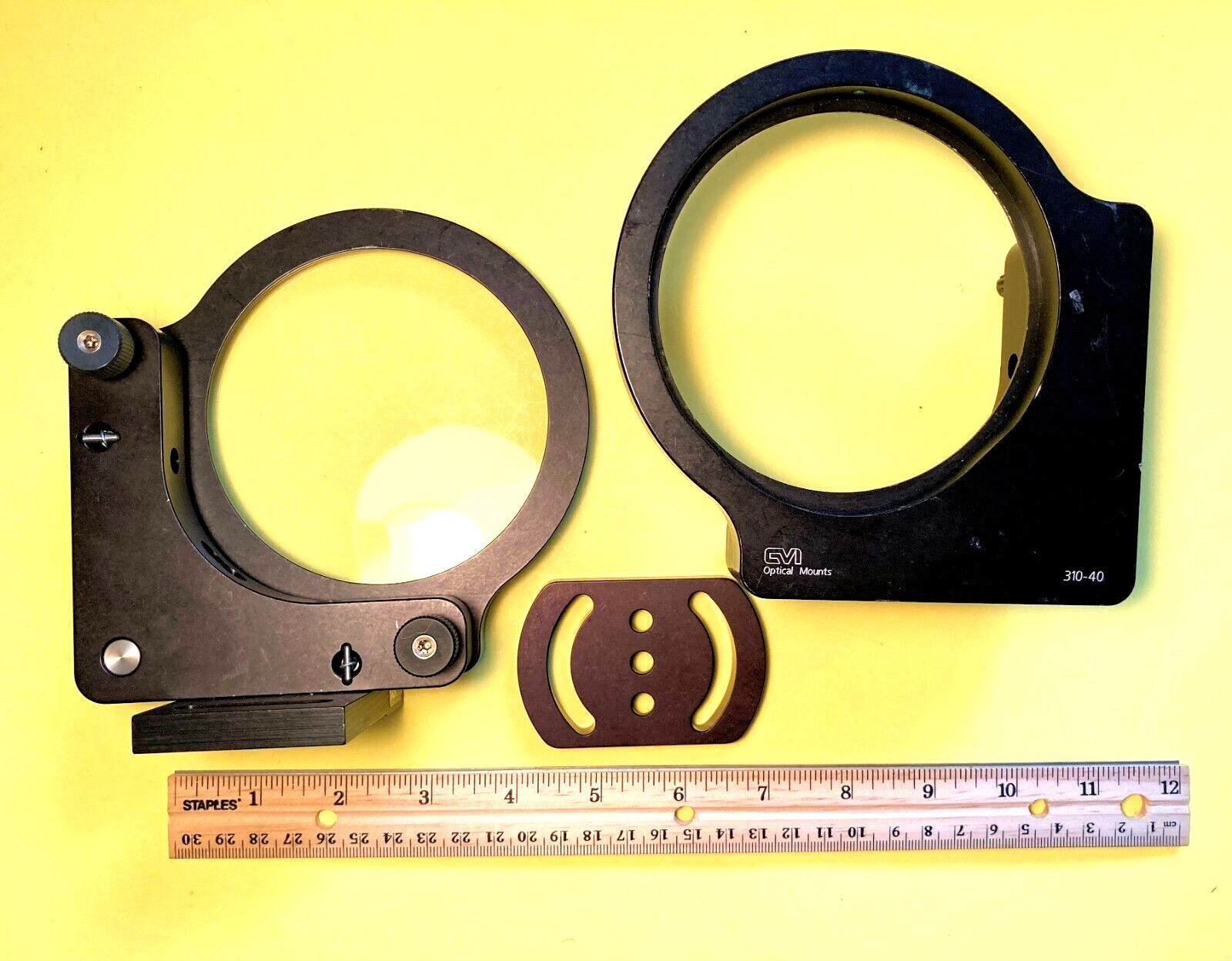 Set of CVI model 310-40 Optical mounts on bases with one UV lens