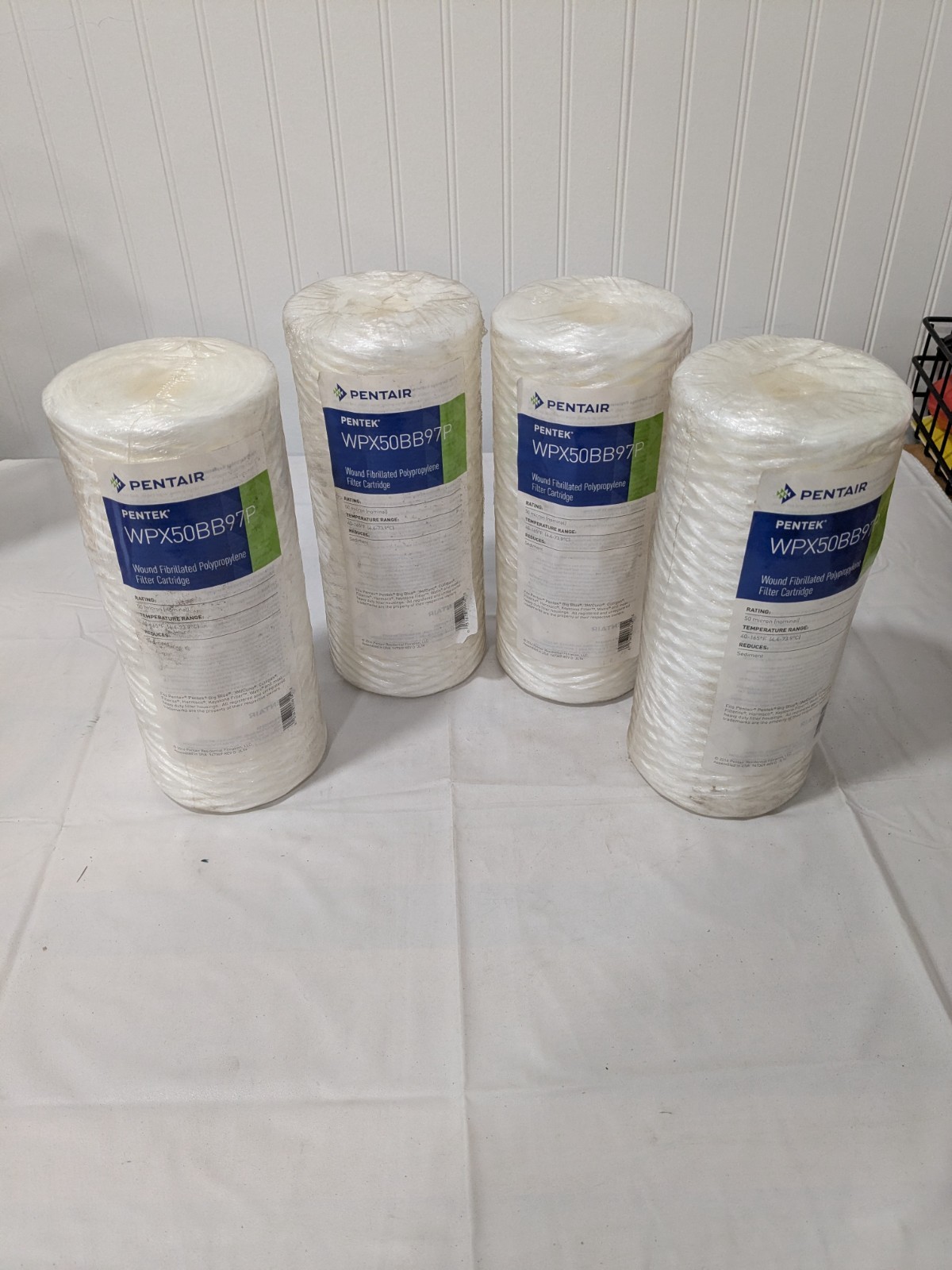 (4) Pentair Water Cartridge Filter: 4-1/2″ OD, 9-7/8″ L, 50 micron WPX50BB97P