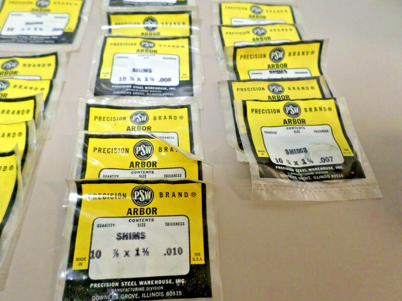 Lot of New Old Stock PSW 7/8″ ID x 1-3/8″ OD Arbor Shims .0001 – .010