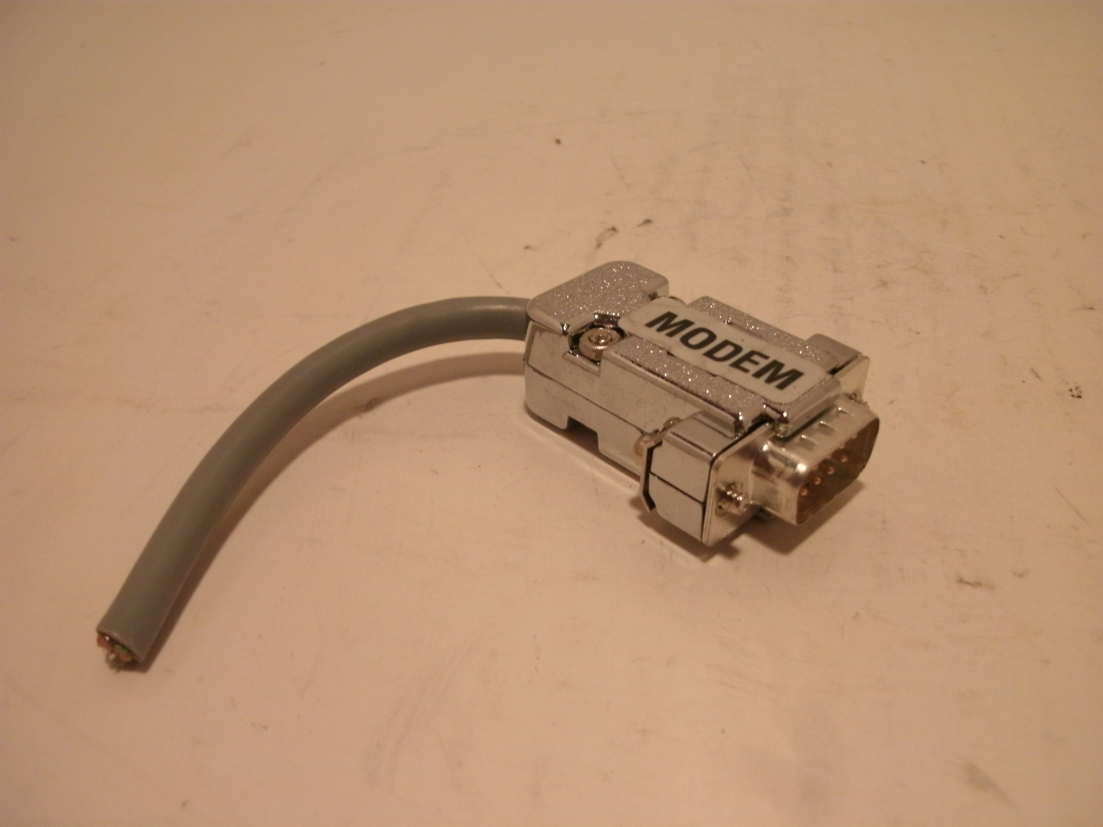 GENERIC MODEM PLUG 9 PIN WITH 3 INCH CORD PLASTIC PLUG CHROME FINISH