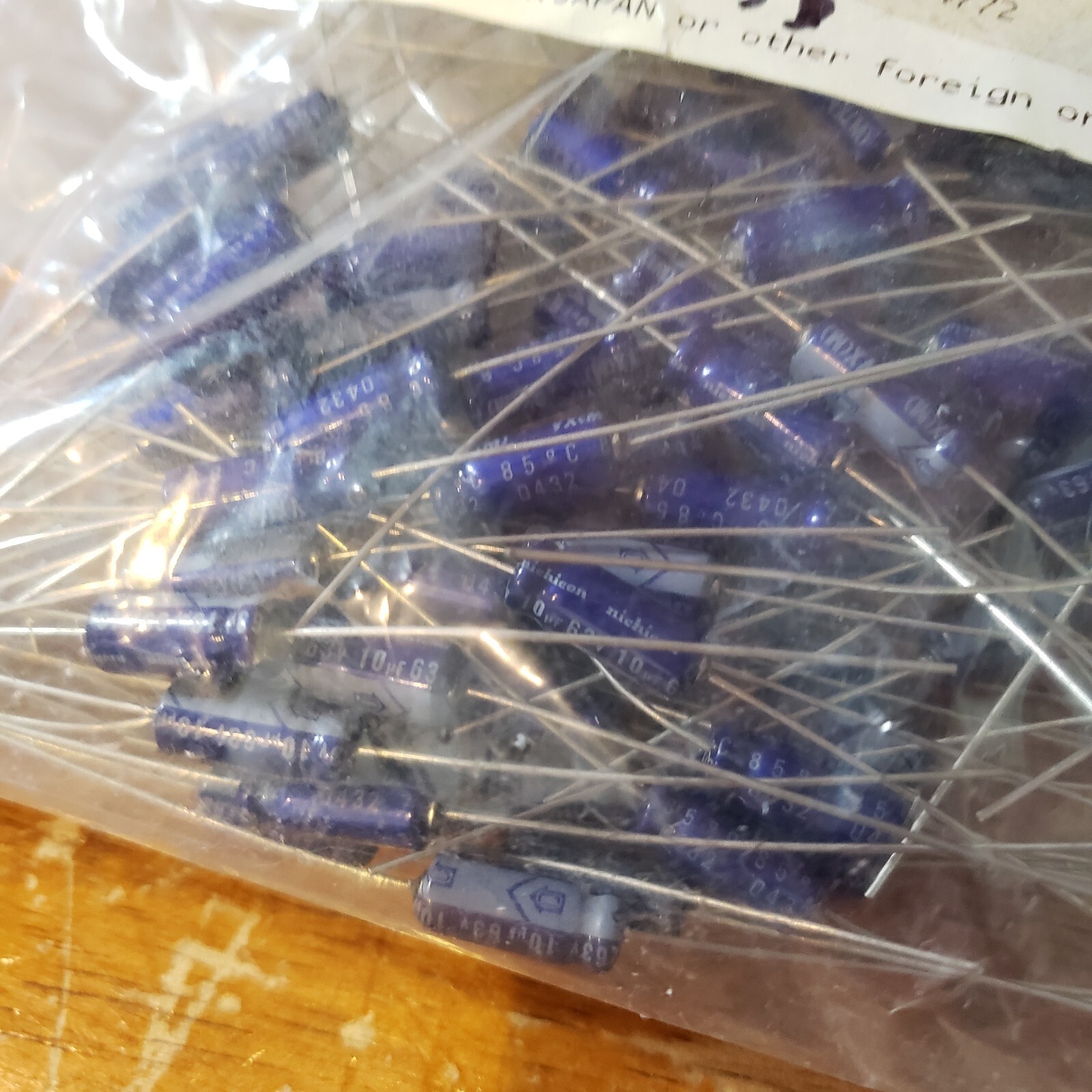 NEW LOT of 80 Nichicon Axial Aluminum Capacitors 63V # TVX1J100MAA C-10uF-63V-5%