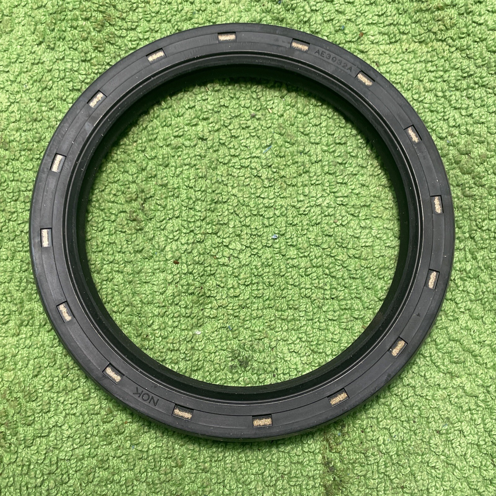 NOK Oil Seal AE3932 Rubber rotation seal. Enclosed inner side, open outer side